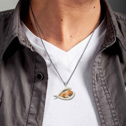 Collier en acier inoxydable avec 2 anges endormis de Poméranie